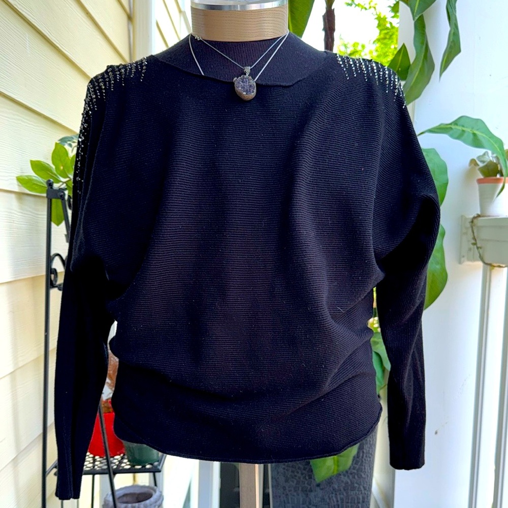 Black Turtleneck Sweater with Cozy Knit and Ribbed Details